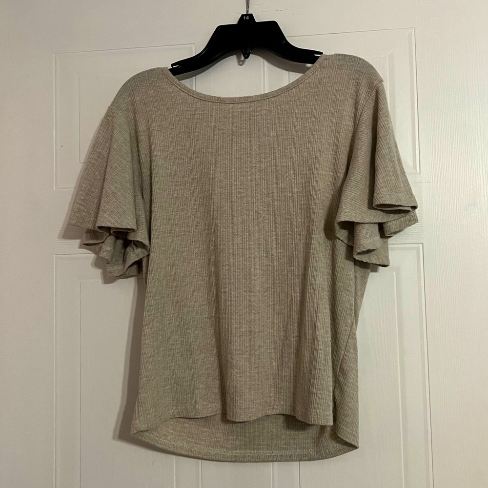 A cute, tan, classy shirt